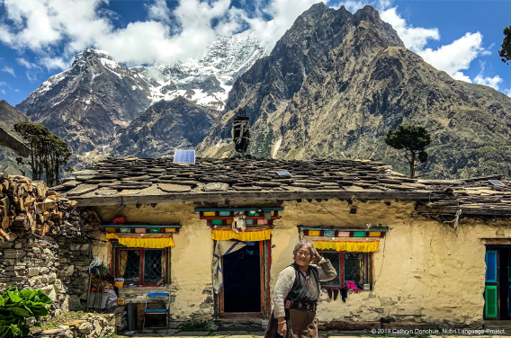 This home is attached to a small monastery in Sama, so it is more carefully constructed and more colourful. Houses are constructed from tightly piled stones but this home has been insulated by a coating of yak dung and paint. The monk’s wife stands in front.